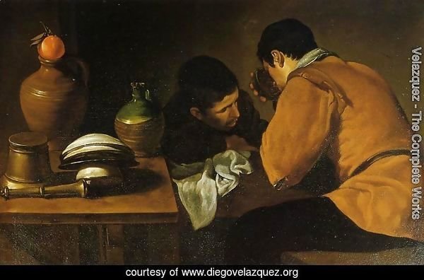 Two Young Men At A Table